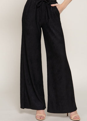TRACY BLACK LOOSE FIT FLARED BOTTOM PANTS