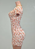 ANTONELLA ORANGE FLORAL RUCHED BODYCON MINI DRESS